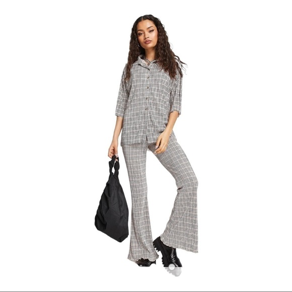 ASOS Design Topshop Petite plisse flared pant in check print - Picture 3 of 12